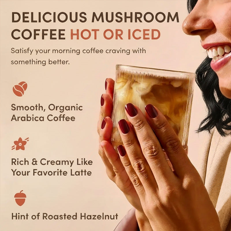 Woman holding an iced mushroom coffee latte made with Shroomsy
