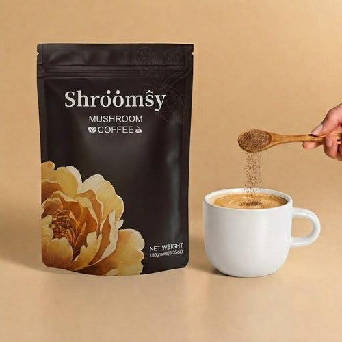 Shroomsy Mushroom Coffee bag with a spoonful of coffee powder being poured into a mug